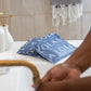 Postpartum pads | View of postpartum pads on a bathroom counter