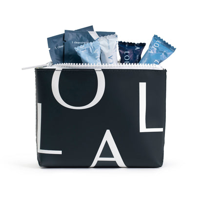 Bag with Lola logo full of Lola products